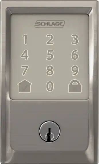 Front entrance of The House on Garling at dusk with keypad entry