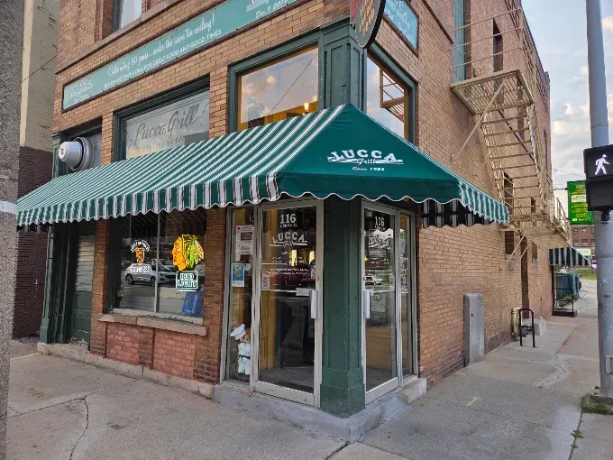 Downtown Bloomington restaurant storefront in the evening