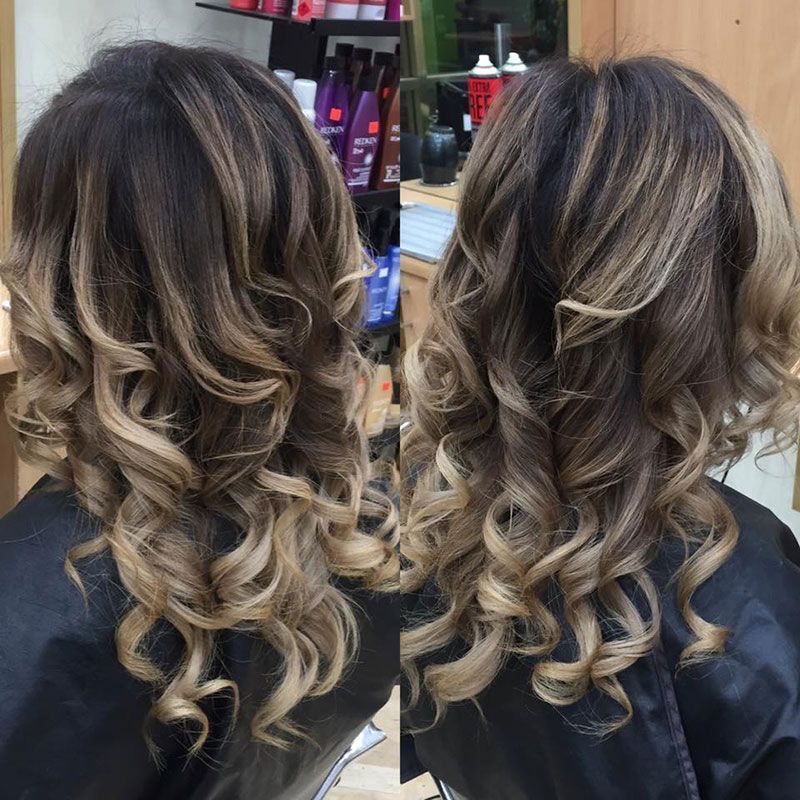 A Woman is Getting Her Hair Done in a Salon — Lush Hair Studio in Tumbi Umbi, NSW