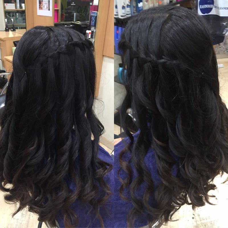 A Woman Has Her Hair in a Half Up Half Down Braid — Lush Hair Studio in Tumbi Umbi, NSW