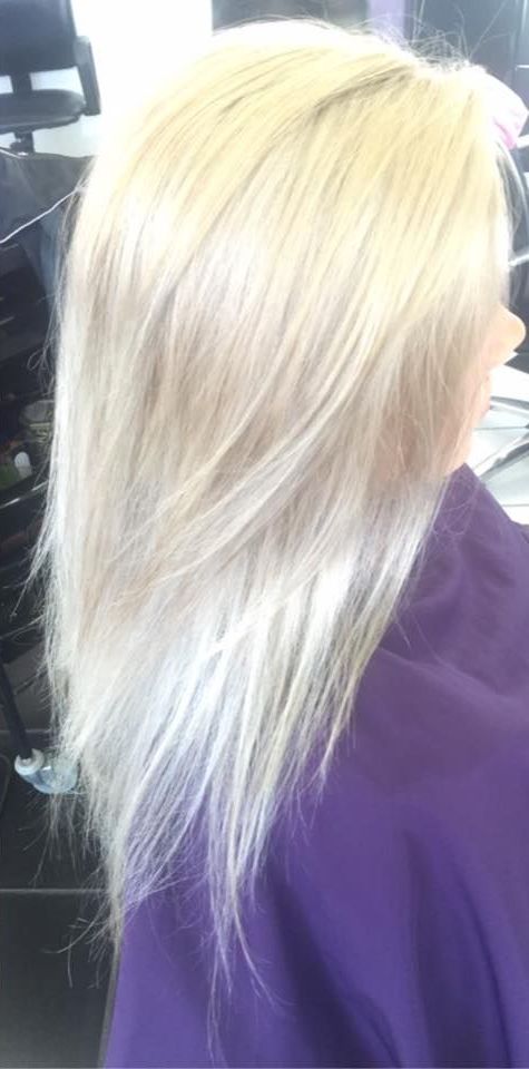 Woman With Long Blonde Hair Wearing Purple Sweater — Lush Hair Studio in Tumbi Umbi, NSW