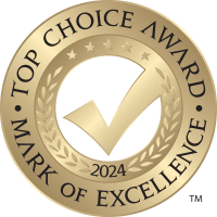 Gold Top Choice Award, Mark of Excellence seal for 2024, with a checkmark and laurel wreath on a gold background.