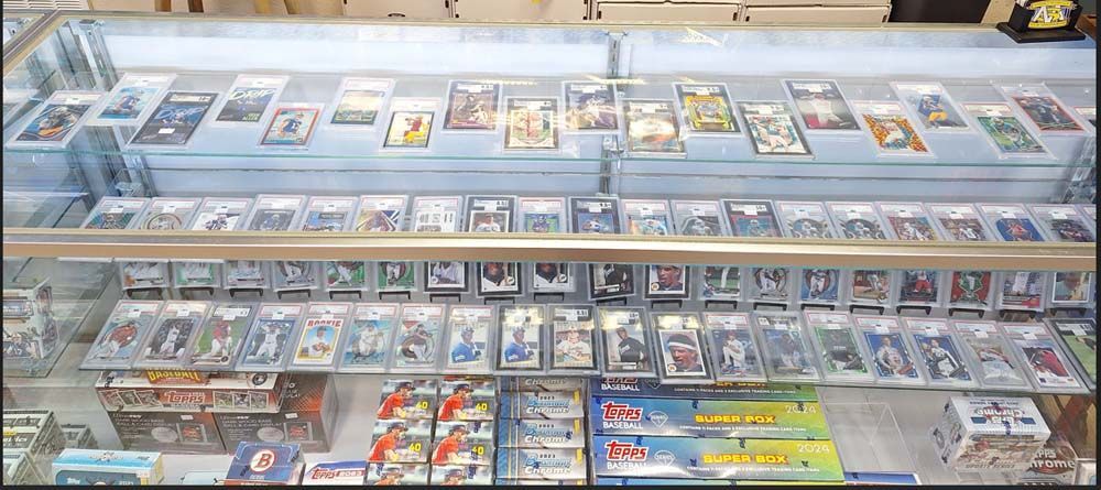 A display case filled with lots of cds and dvds