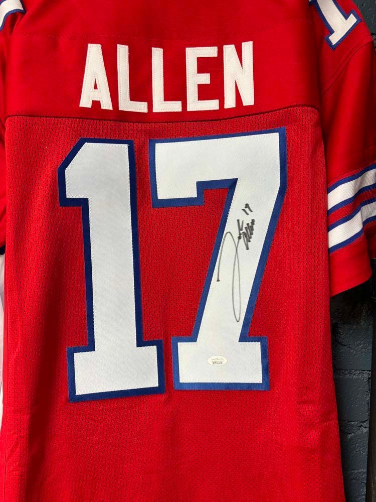 A red jersey with the name allen on it