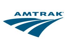 A blue and white amtrak logo on a white background.
