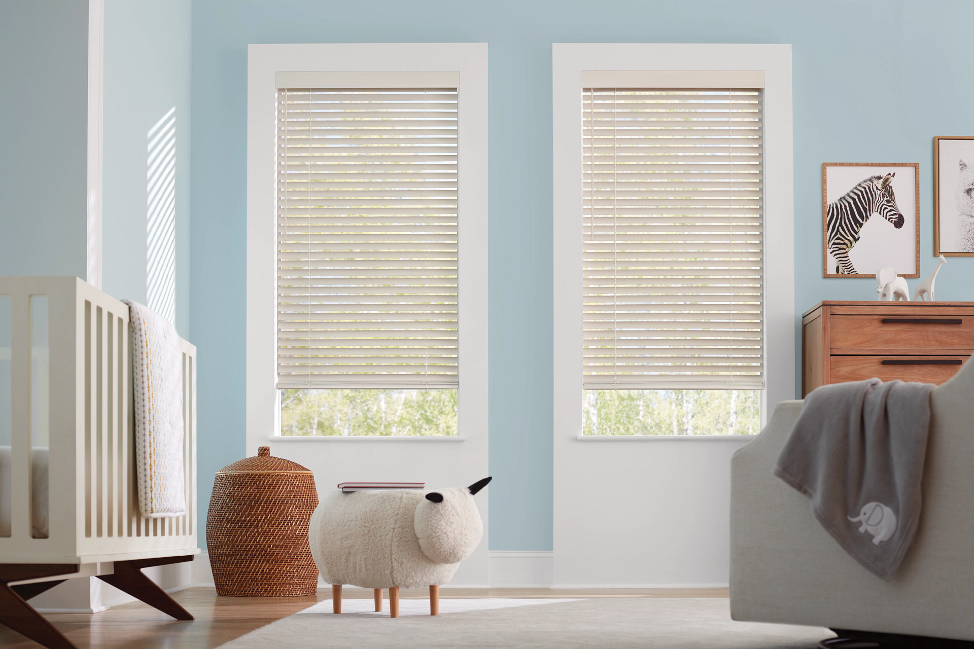 Custom Hunter Douglas window blinds for windows and doors in a chic and modern kitchen