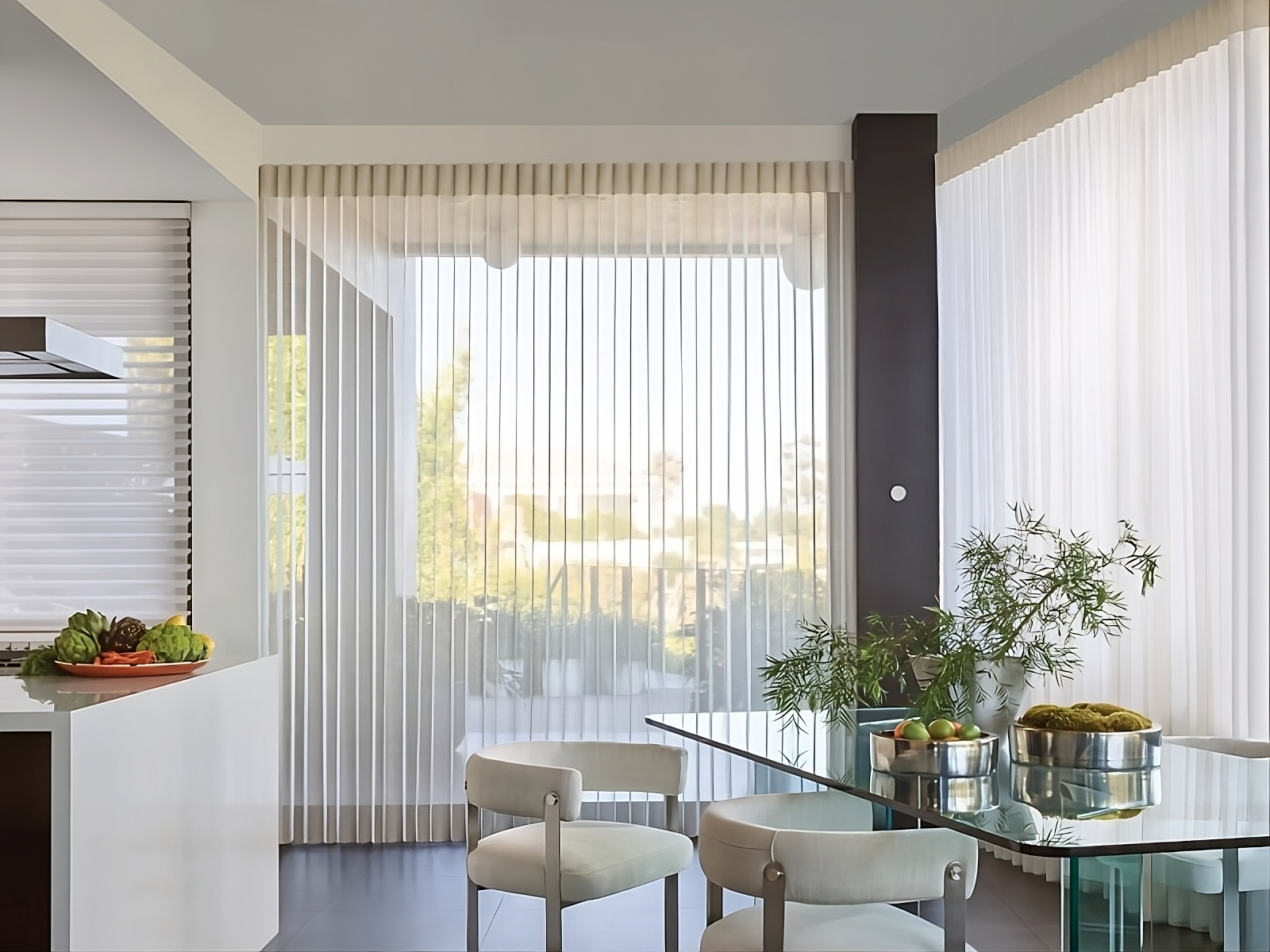 Custom Hunter Douglas window blinds for windows and doors in a chic and modern kitchen