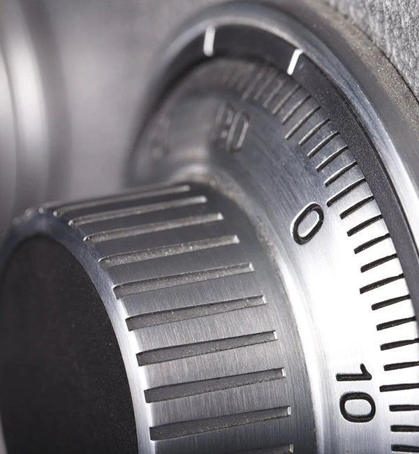 Close-Up Of A Silver Safe’s Combination Dial With Black Numbers and Markings — CQR Locksmiths In Moree, NSW