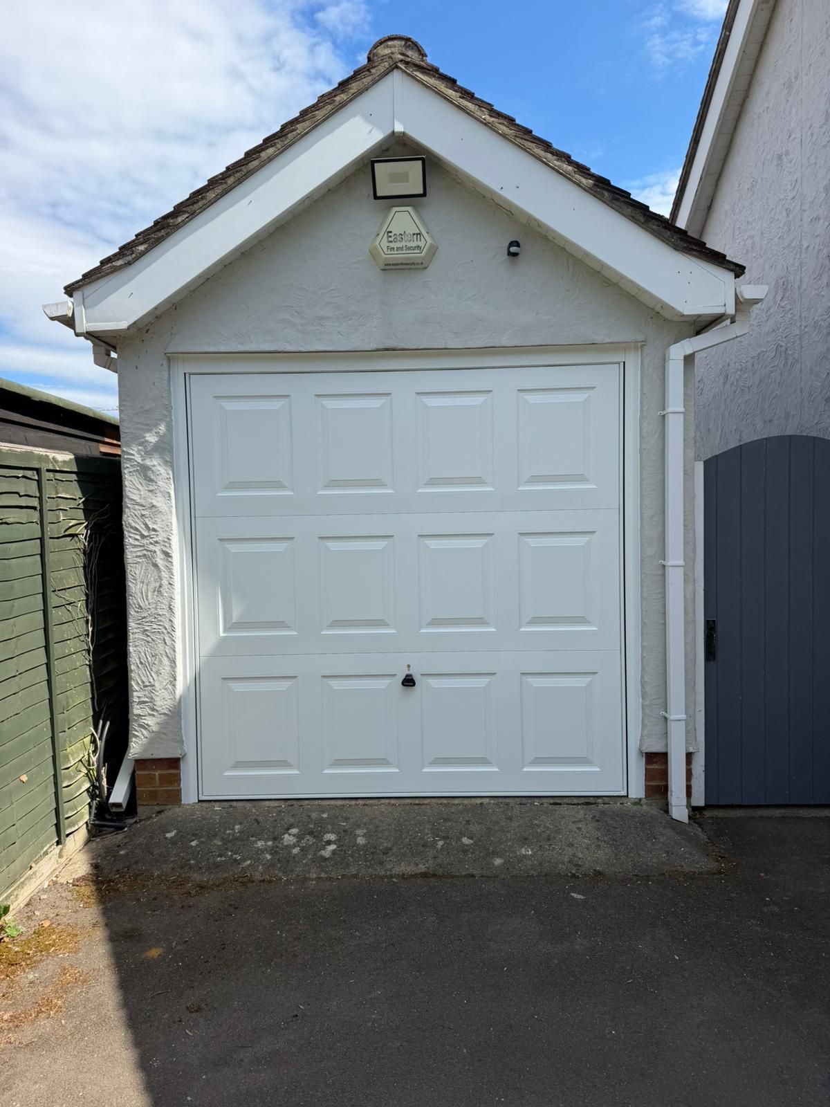 Manor garage doors installed a new Garador Steel Beaumont framed canopy up and over garage door 