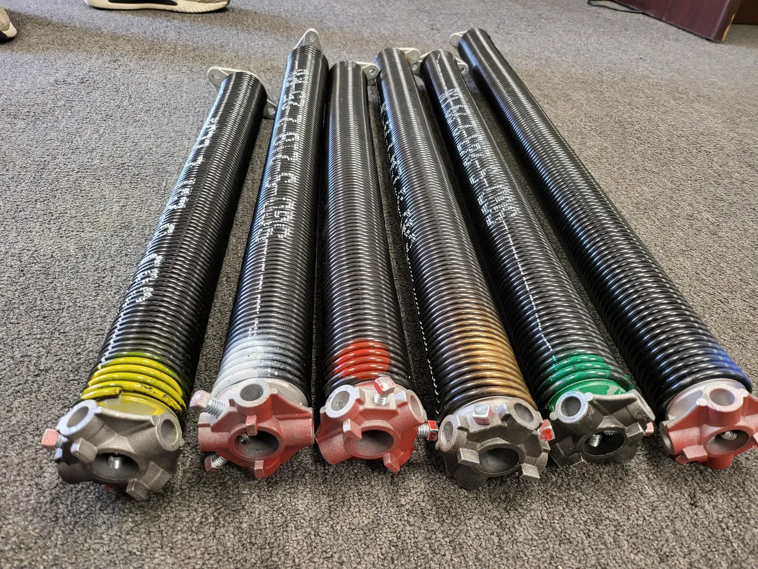 Repair springs for garage doors 