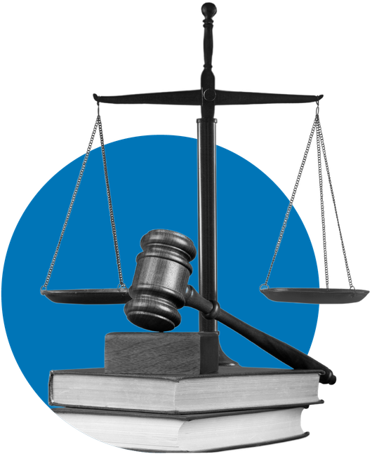 A judge 's gavel is sitting on top of a stack of books
