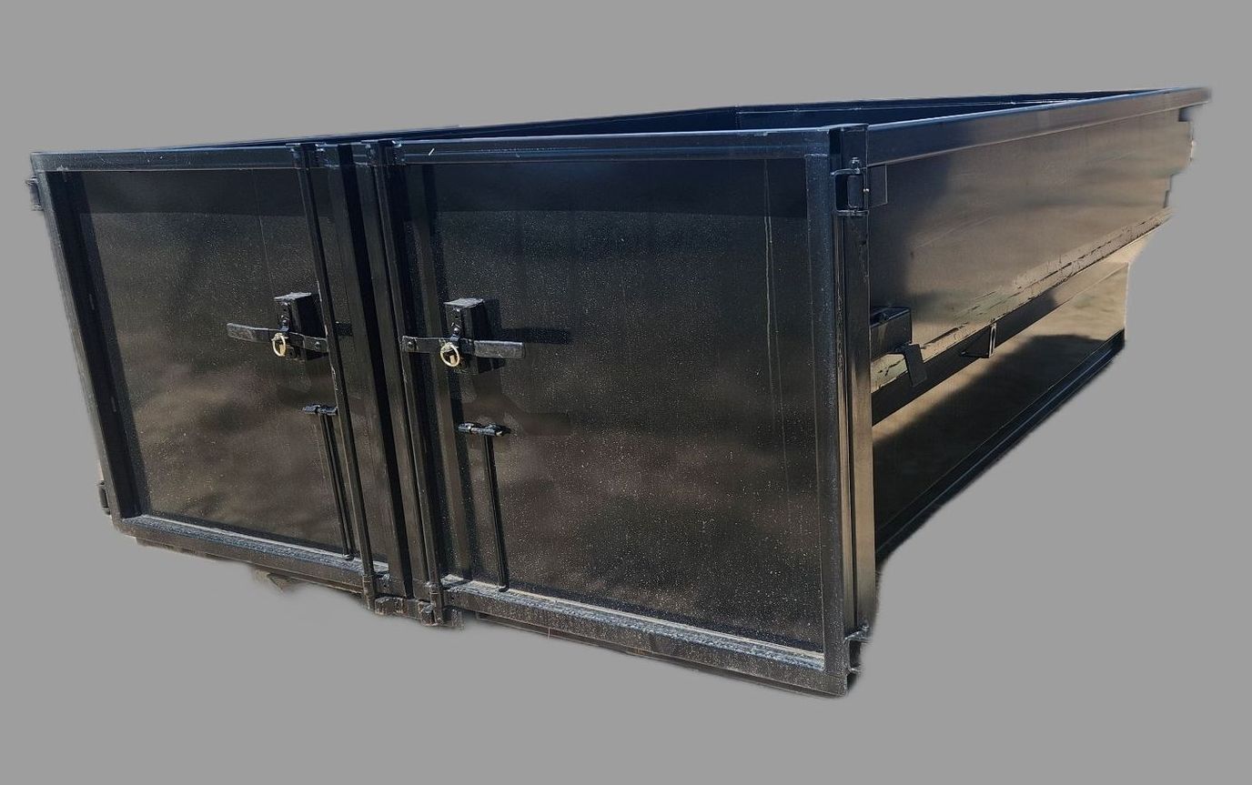 A black metal box with two doors on a gray background.