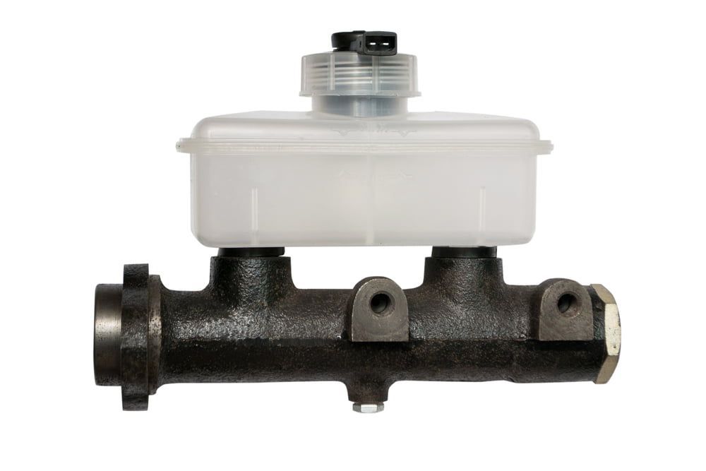 Brake master cylinder isolated on white background. manual vs power brakes, manual or power brakes