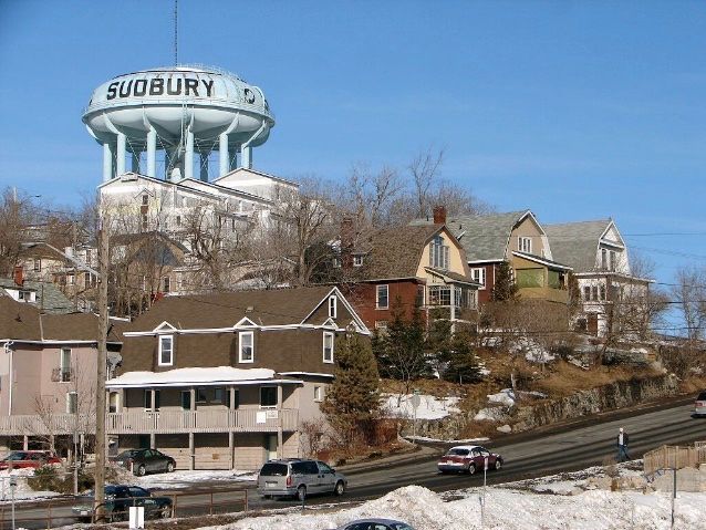 A water tower with the word sudbury on it