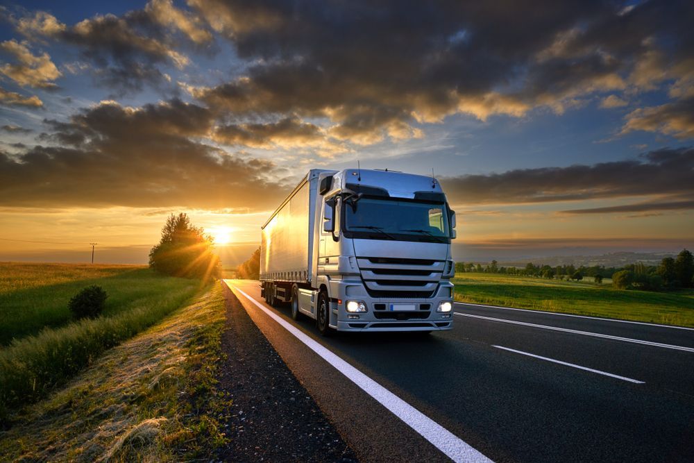 Truck Driving At Sunset — Reliable Driver Training in Darwin, NT