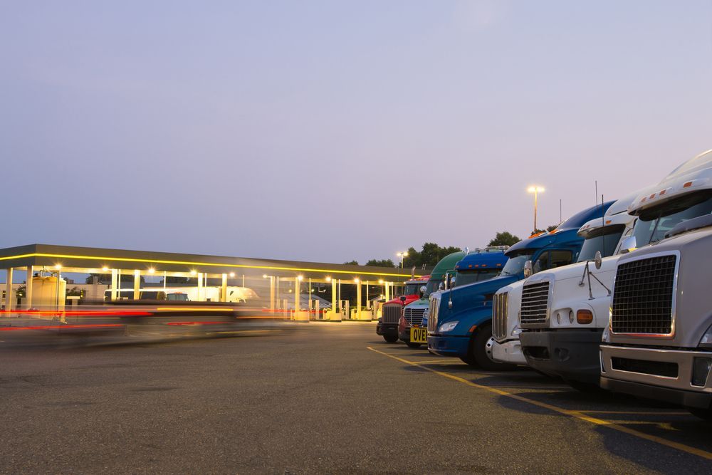 Trucks Parked At Petrol Station — Reliable Driver Training in Darwin, NT