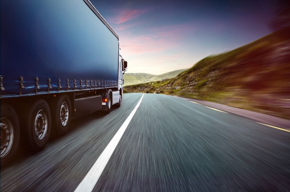 Large Truck Driving On Highway — Reliable Driver Training in Darwin, NT