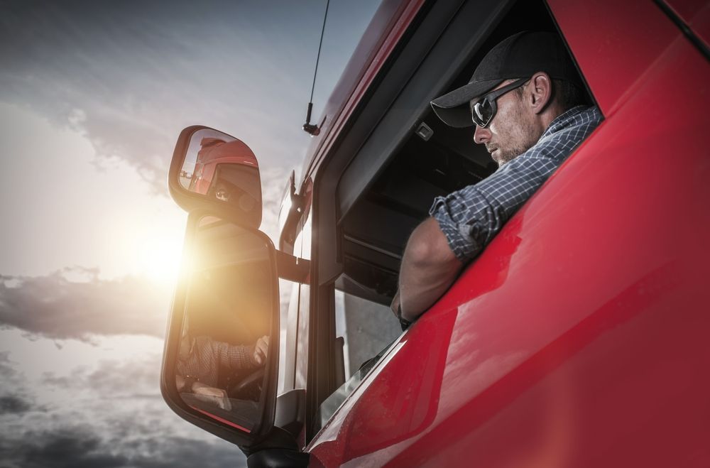 Driver In Red Truck — Reliable Driver Training in Darwin, NT