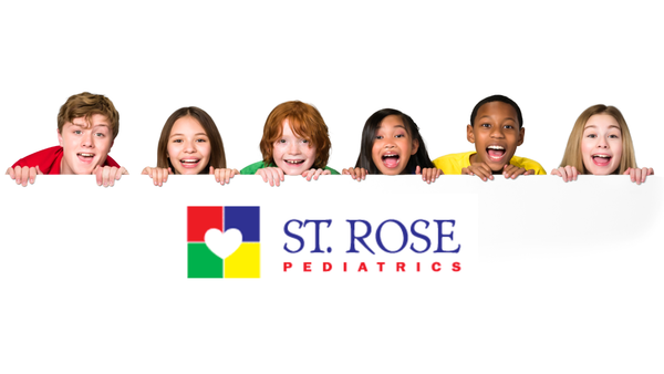A group of children smiling, holding a banner with the logo. 