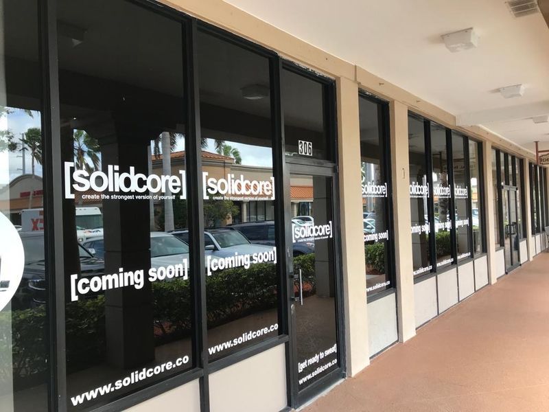 Exterior of a storefront for solidcore fitness, 