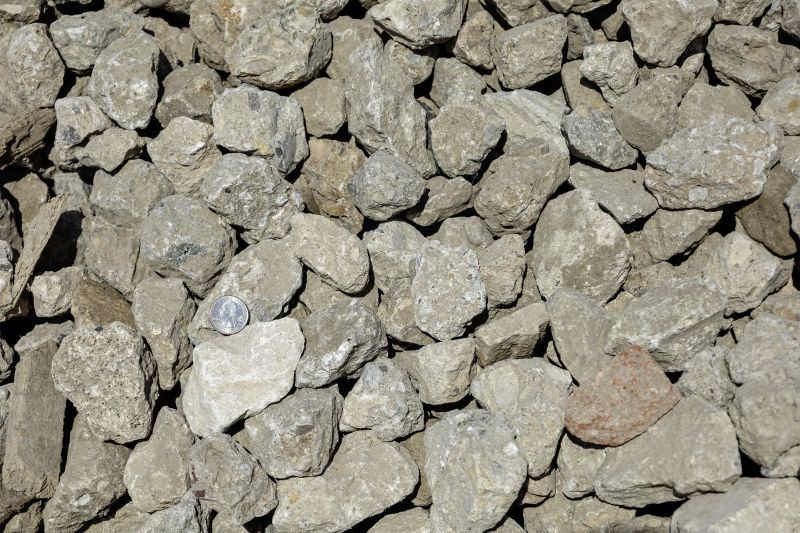 Pile of rough gray rocks and gravel filling the frame