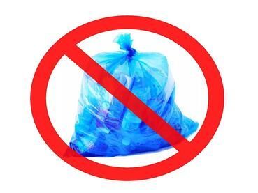 Blue trash bag crossed out with a red prohibition symbol