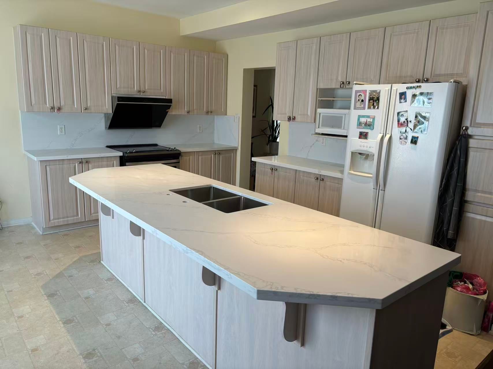 Custom kitchen cabinets with quartz countertop and island in London, Ontario