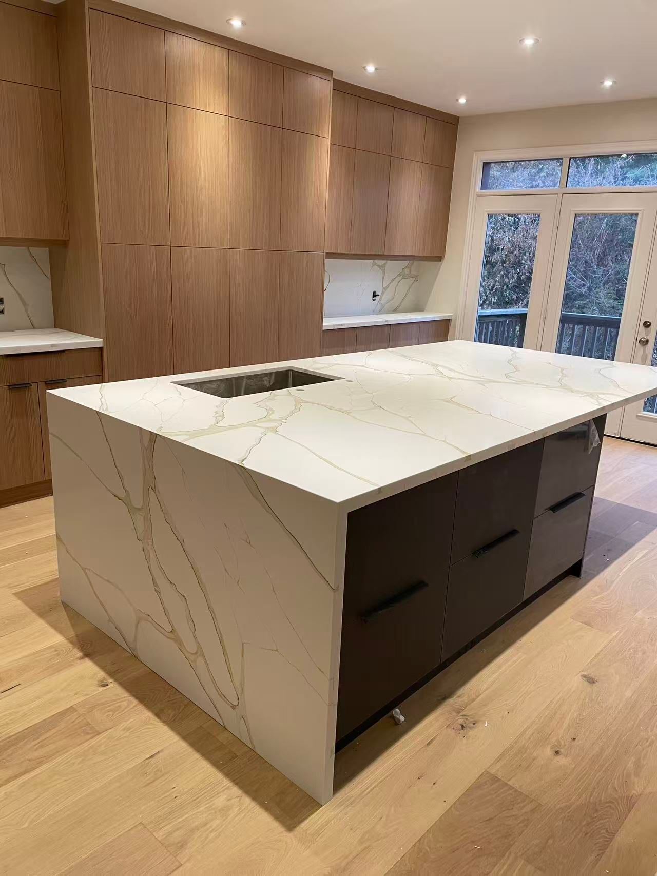 Custom wood kitchen cabinets with quartz countertops in London, Ontario