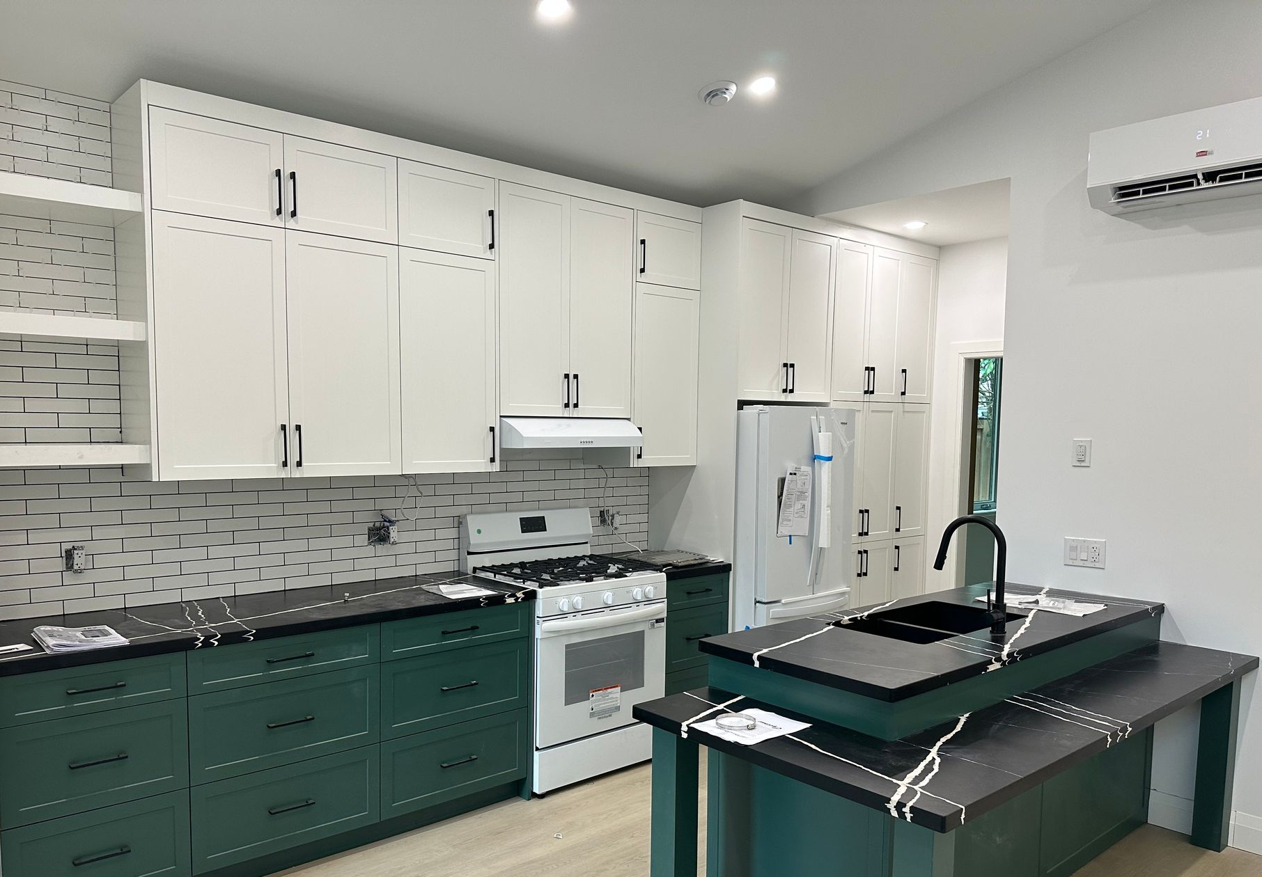 White kitchen cabinets with custom storage in London, Ontario
