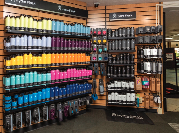 A store filled with lots of water bottles and socks