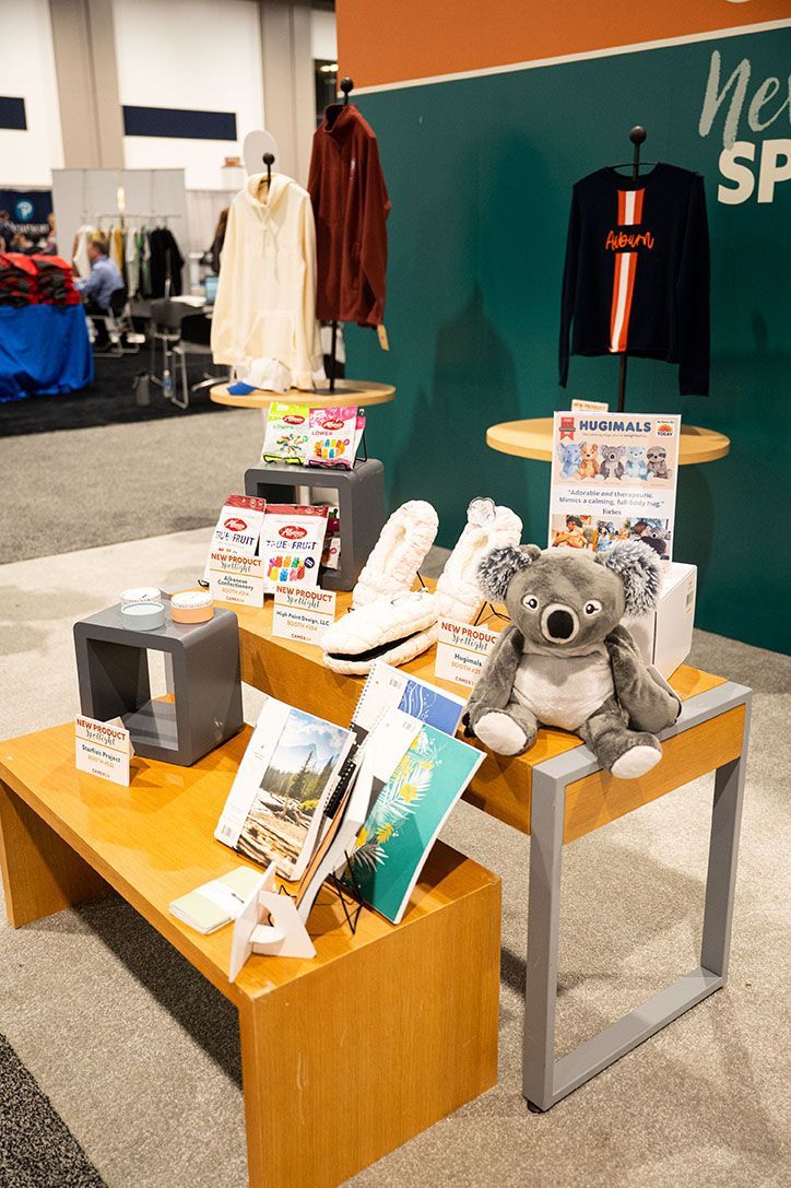 A wooden table with a stuffed koala on it.