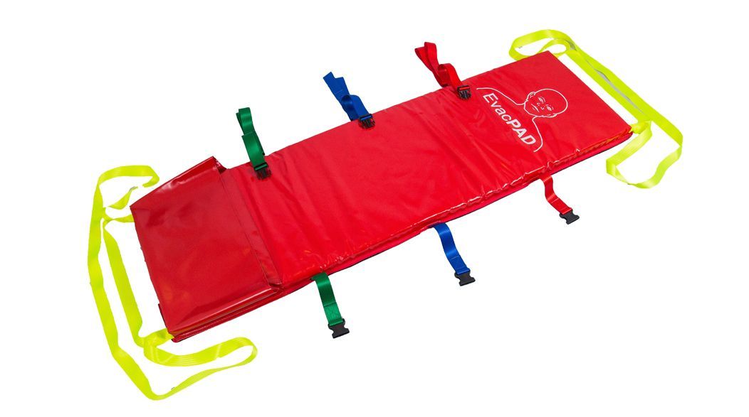 Red patient transfer mattress with straps.