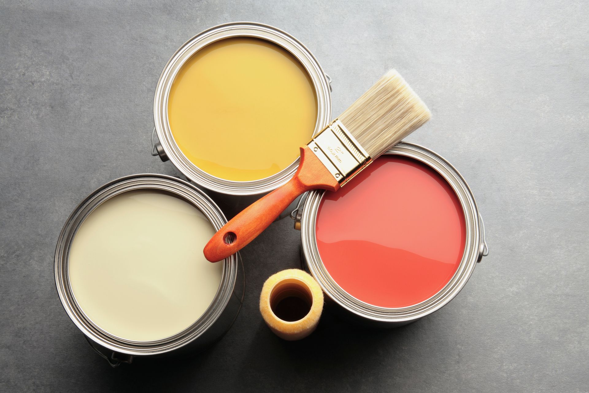 Three Paint Cans With Brush and Roller | Monterey, CA - Luxury Custom Painting Inc.