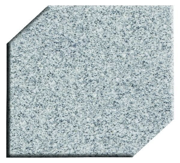 Black glittery hexagonal tile with clipped corners on a white background