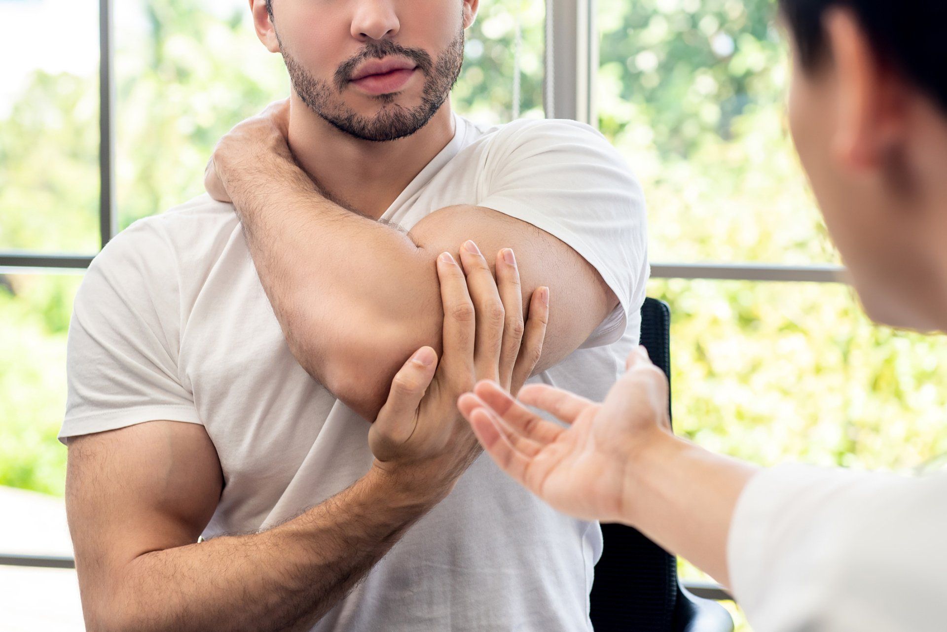 A Doctor Checking The Elbow — Powell, Ohio — Dublin Family PT