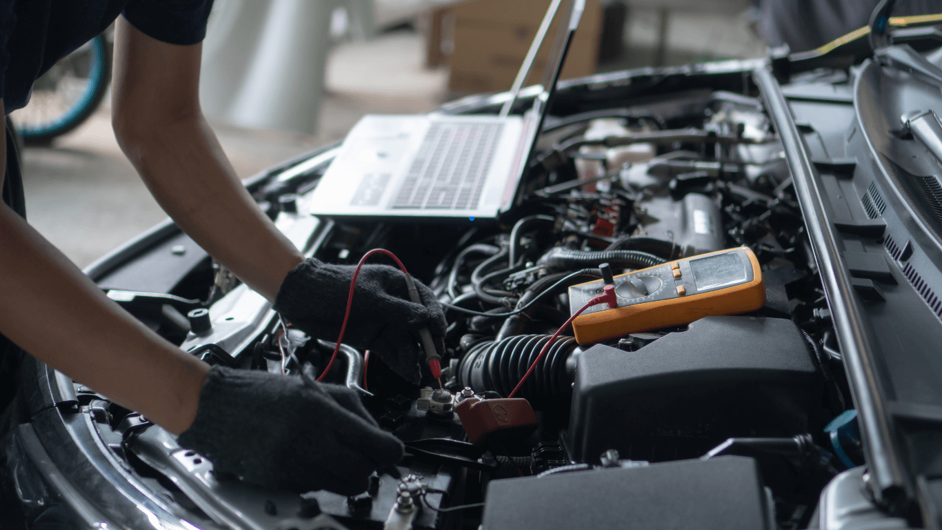 a mechanic performing a vehicle diagnostic evaluation