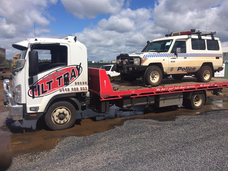 Truck Towing a Police Car — Towing in Walgett, NSW