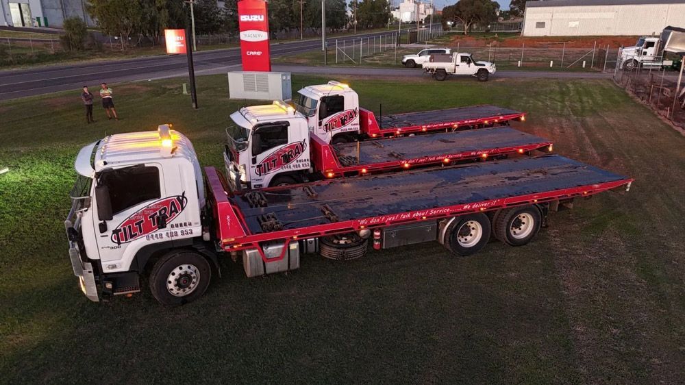 Three Tow Truck Parked on Roadside in Dubbo