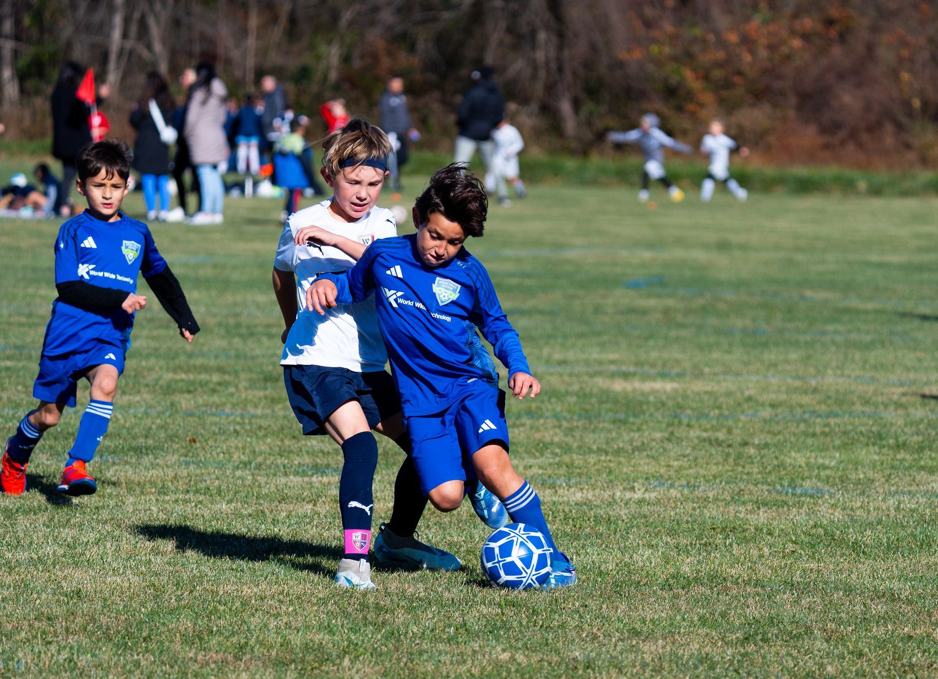 A group of young boys playing soccer for Great Falls Reston Soccer Club