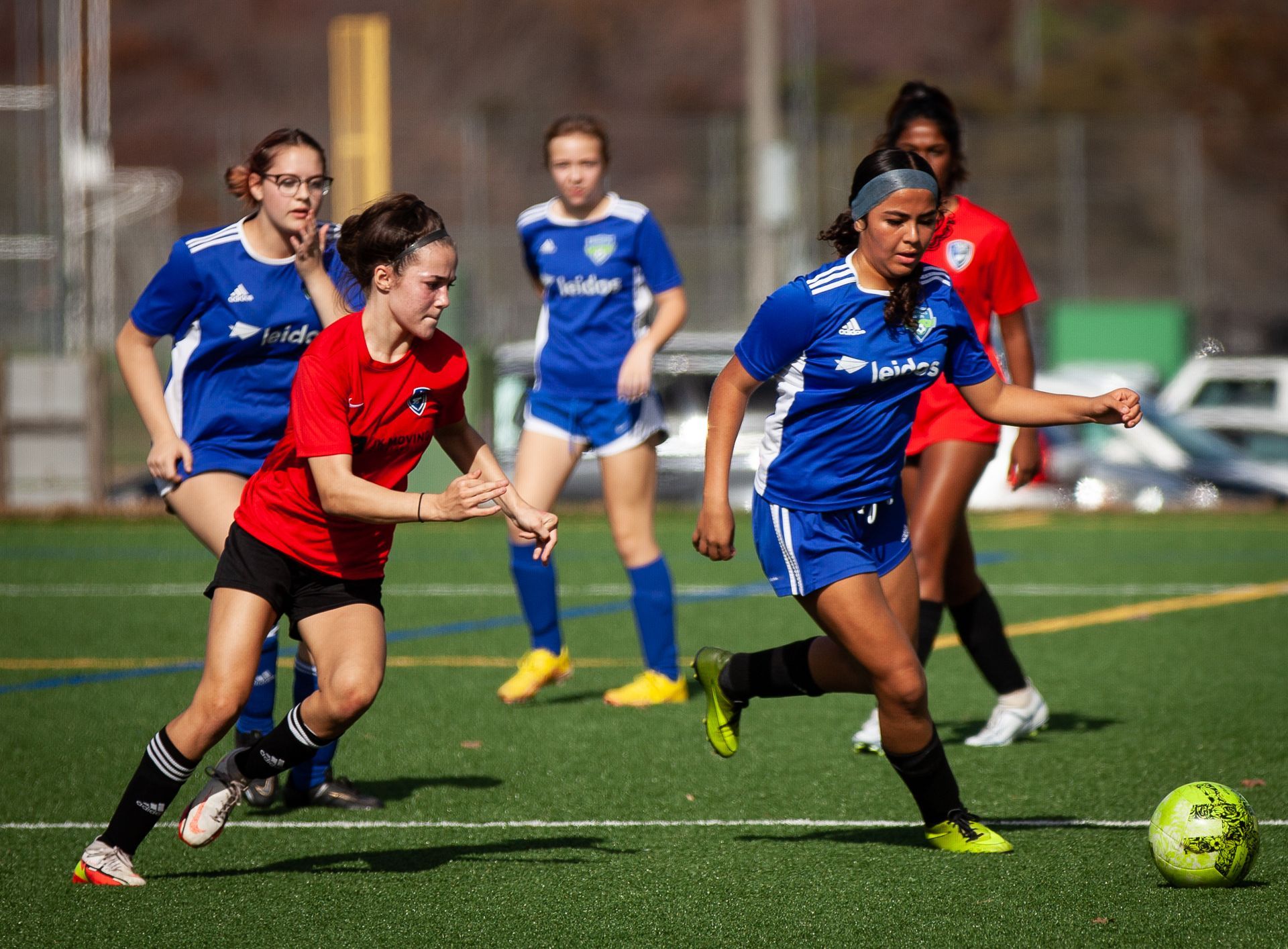 Young women playing a soccer game for Great Falls Reston Soccer Club