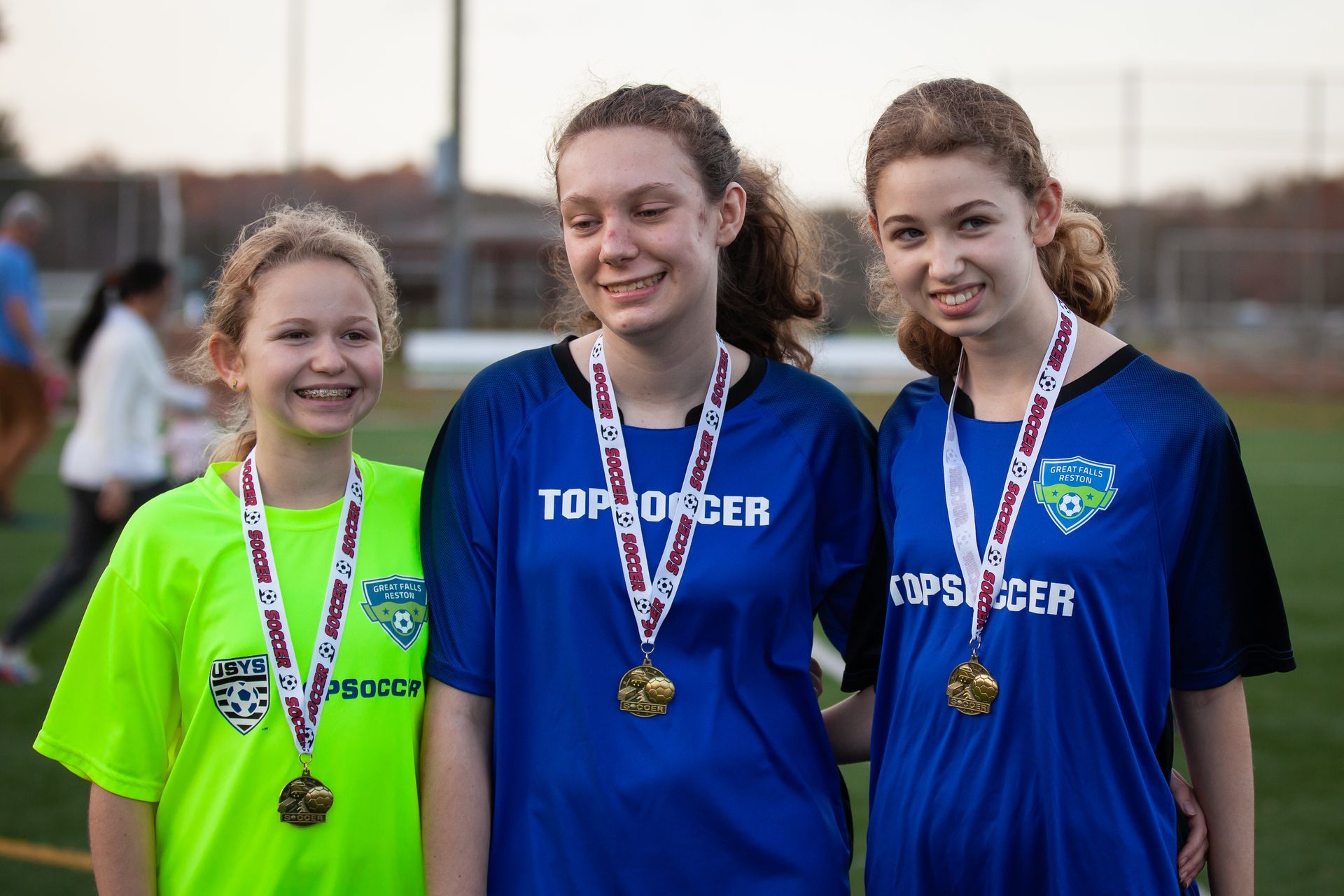 Three girls playing TopSoccer with Great Falls Reston Soccer Club
