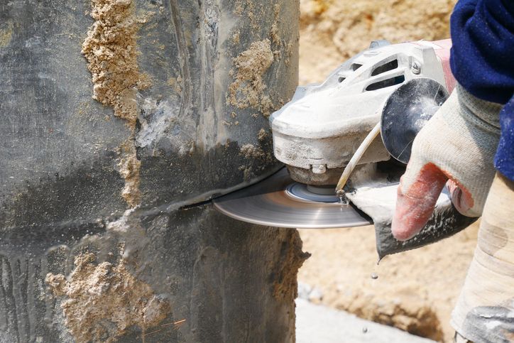 Electric Cutter Penetrating A Cement Pillar | Salt Lake City, UT | Walsh Concrete Cutting Specialists Electric Cutter Penetrating A Cement Pillar | Salt Lake City, UT | Walsh Concrete Cutting Specialists