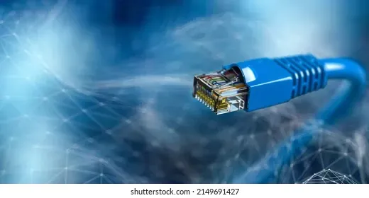 Blue Ethernet cable with transparent connector against a blue, swirling background.
