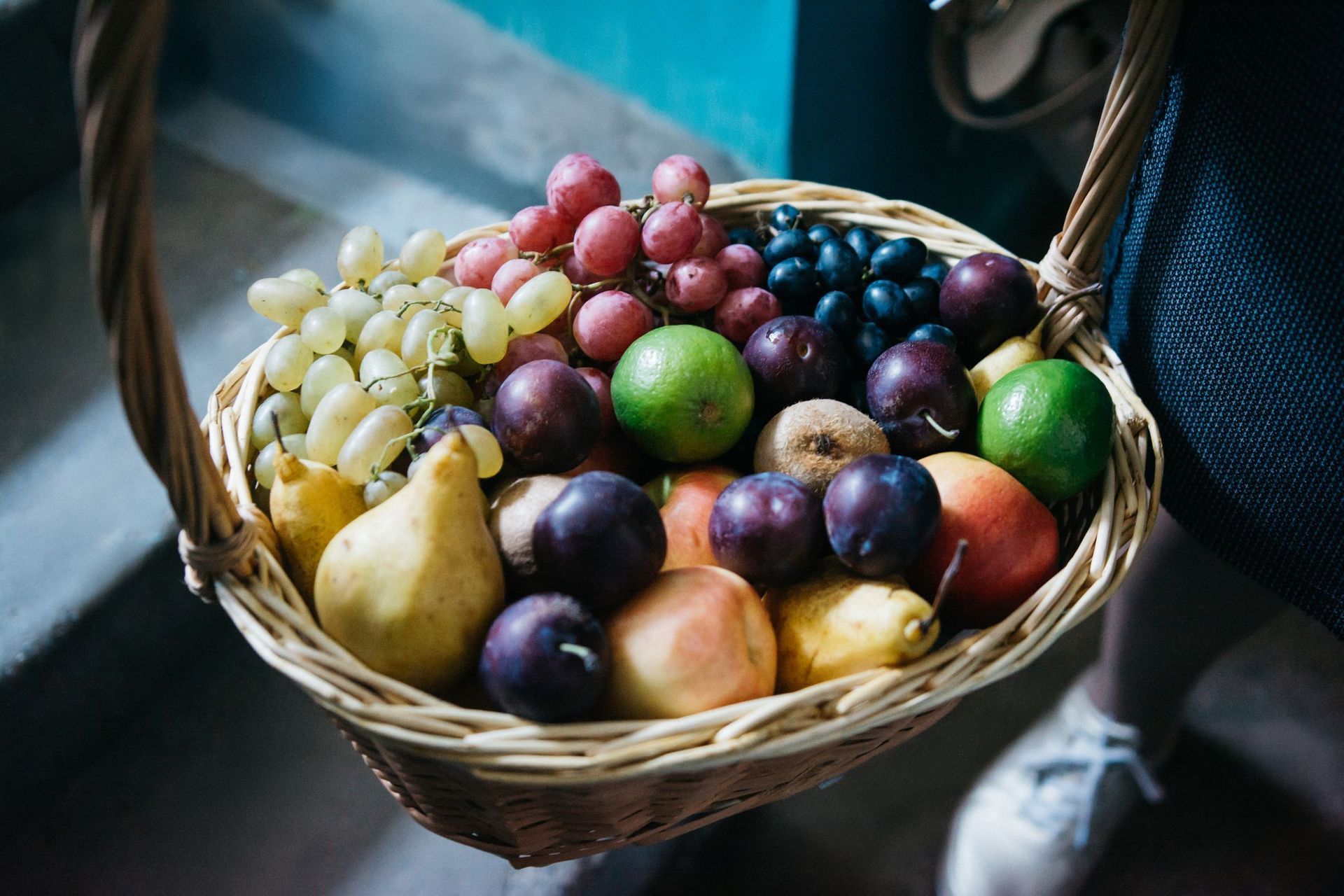 A bowl of fruit on a table