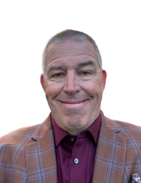 Smiling man in a plaid blazer and maroon shirt against a white background
