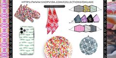 green oval around floral yellow red and blue confetti and floral patterns confetti glass plate with blue blossoms round pot holder face masks above and hanging red tea towels center and confetti oven mitt and pot holder set left top corner and below green palm fronds i phone case