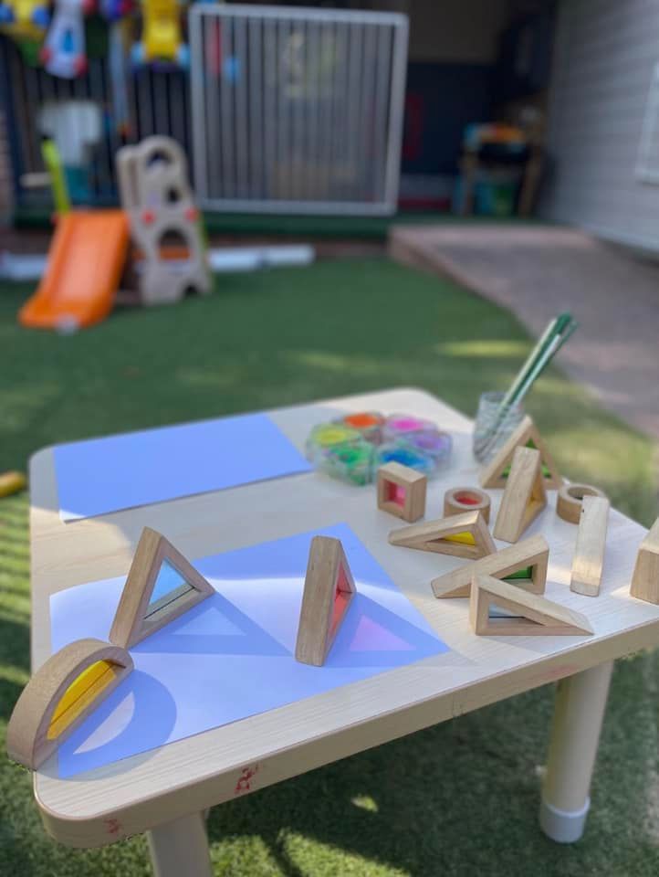 A Group Of Children Are Playing In The Sand On A Beach — Kiddies Hut @ Diamond Beach In Diamond Beach, NSW