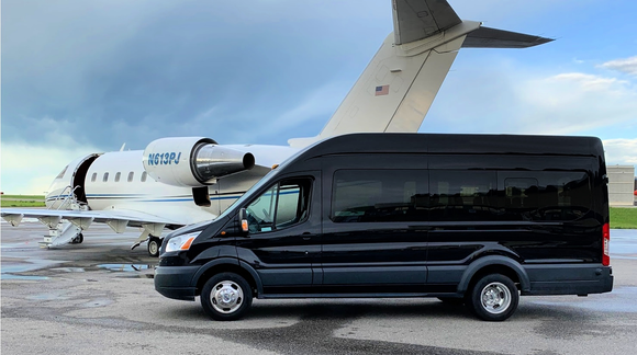 Executive Shuttle Buses for Transfers black 14 passenger Ford Transit shuttle bus