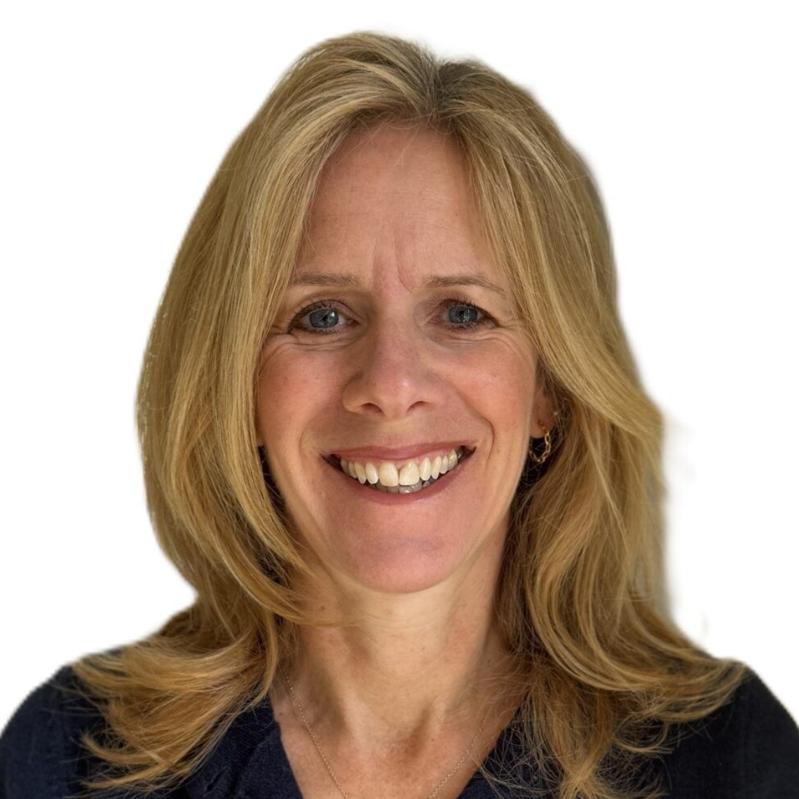 Smiling blonde woman in a dark top against a white background