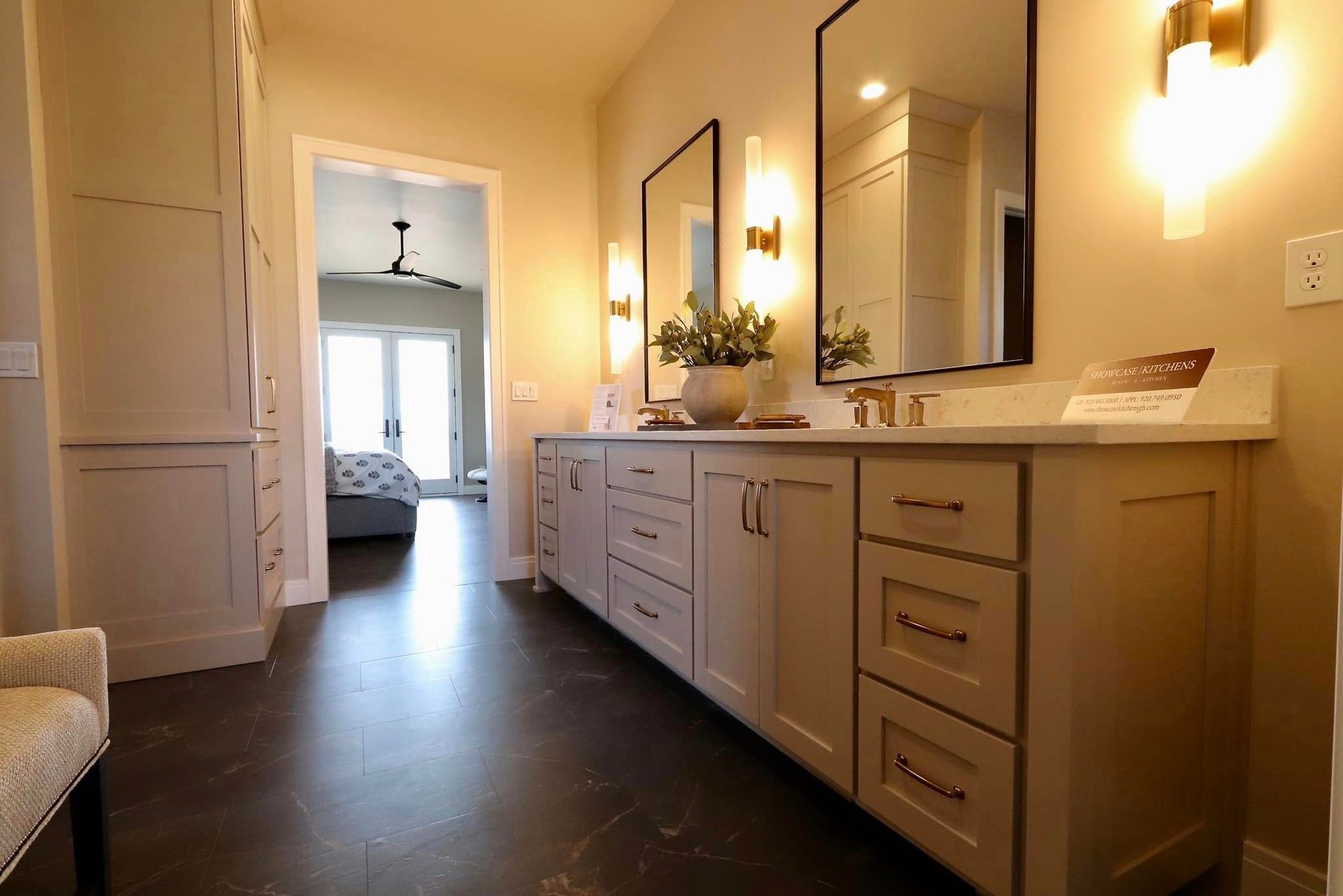 A bathroom with two sinks and two mirrors.